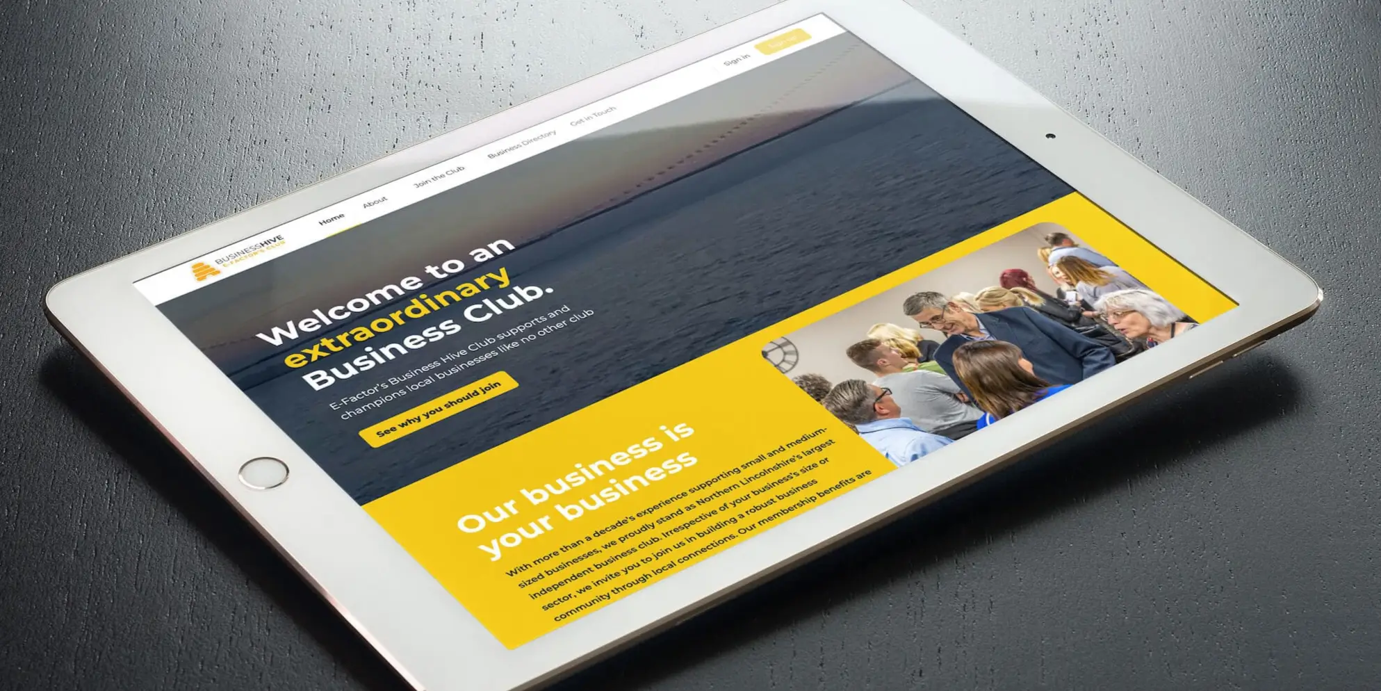 An iPad showcasing E-Factor's Business Hive, a new exclusive member hub for business clubs.